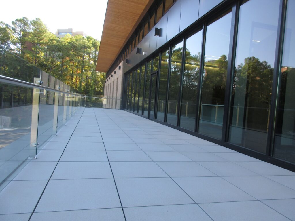stamped concrete and floor to ceiling windows