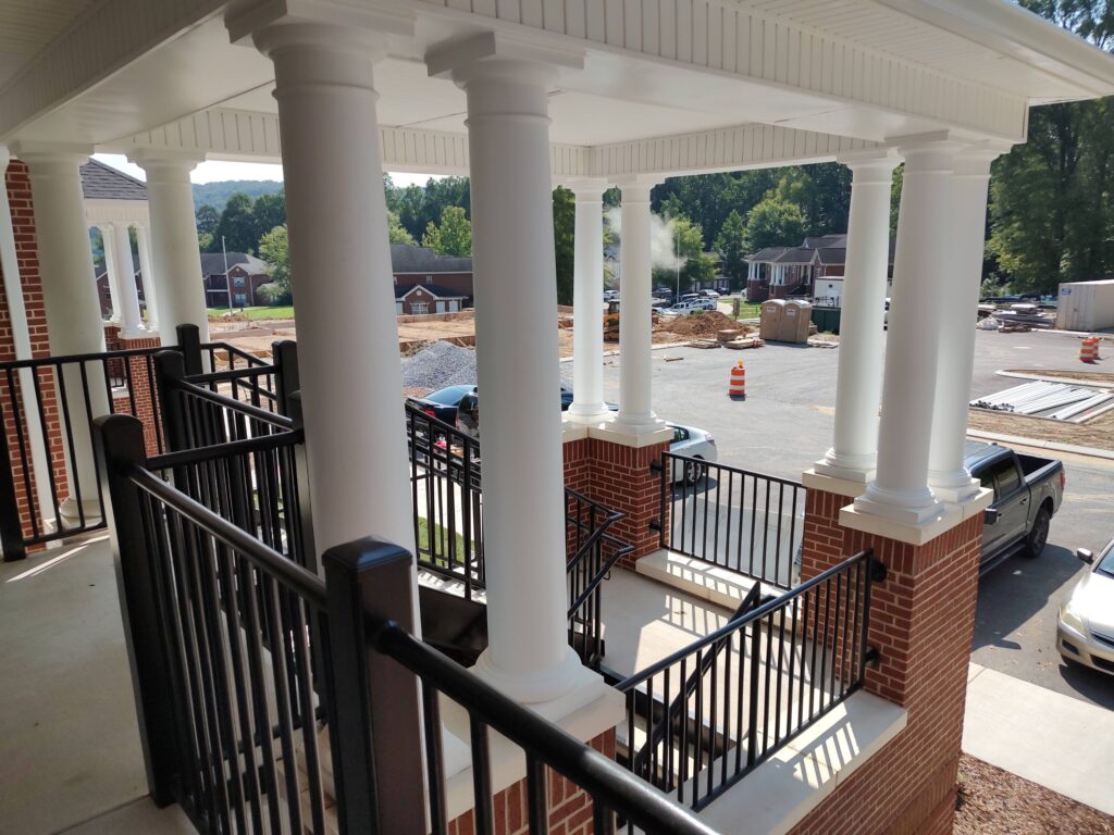 white columns black stairs