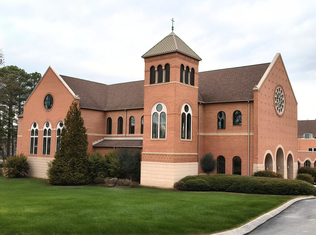brick covenant church with arches and tower