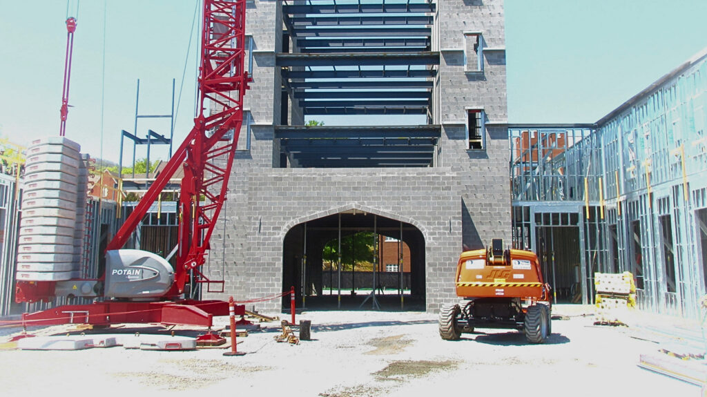 construction on grey brick building