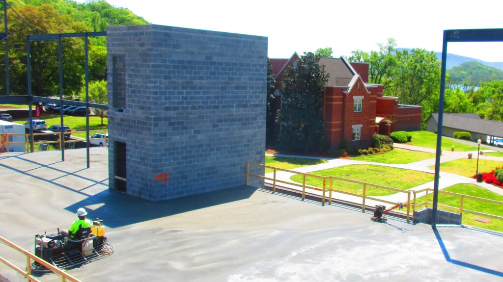 grey brick building construction